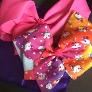 Two “JoJo Siwa” bows